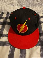 Front view showing embroidered lightning bolt logo and color scheme