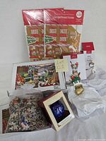 All items grouped: gingerbread kits, puzzle, ornaments