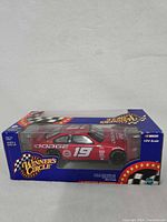 Front angled view of sealed Winner's Circle Casey Atwood #19 Dodge die-cast car in box
