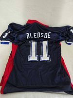 Back view showing BLEDSOE name and number 11