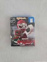 Front of sealed OYO Sports Niklas Backstrom minifigure box