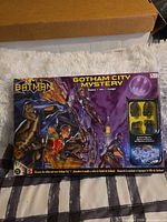 Front of boxed Batman Gotham City Mystery board game