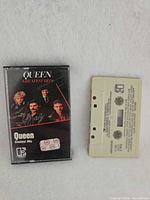 Cassette and case front displaying album art