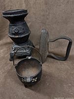 miniature stove, cauldron, sad iron grouped