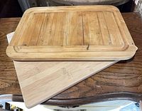both cutting boards stacked showing comparative size and finishes