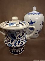 Two-handled lidded urn and ginger jar