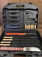 First case open showing contents and empty slots