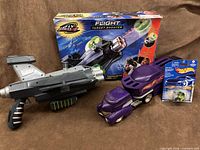 Overall view of shooter with box, carrier vehicle and sealed car