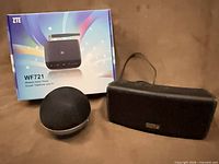 All three items: ZTE WF721 box, spherical iHome speaker, rectangular iHome speaker