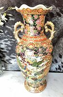 Full view of vase showing shape, pattern and handles