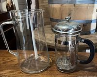 Overall view of glass pitcher and Pyrex French press side by side