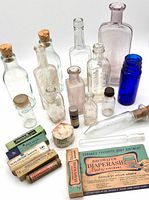Full lot showing bottles, packaging, sign and stand