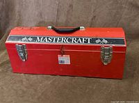 Front view showing Mastercraft logo, latches, handle