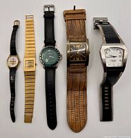 Group shot of all five watches side by side