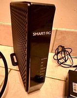 Front of SmartRG SR808ac modem router showing branding and LED indicators