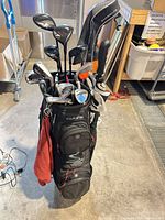 Full view of cart bag with all clubs from front