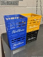 Front view of four KoolKrates mini crates stacked together showing colors and branding