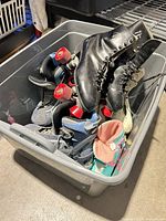 Bin containing multiple pairs of skates