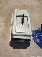 Top view showing handle, lid panels, overall color