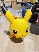 Front view showing Pikachu face, ears, body shape