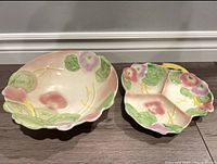 Top view of serving bowl and divided dish showing floral pattern and shape