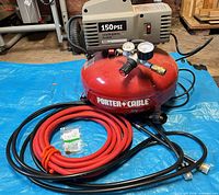 Porter-Cable pancake air compressor with hoses and fittings