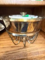 Whole chafing dish with lid on stand