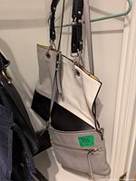 Kate Spade tote and Calvin Klein crossbody hanging