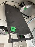 Top view of rectangular cast iron griddle showing flat griddle surface and handle