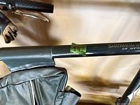 Top tube showing green color, Shimano SIS 18 Speed decal, attached frame bag