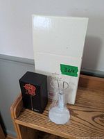 Outer boxes, display stand still wrapped