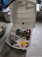 Overall view of plastic tote and contents
