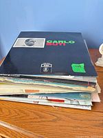 Stack of LPs, top cover Carlo Buti, several others beneath
