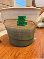 front view of ceramic planter showing glaze and size label