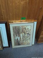 River landscape print in gold frame