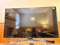 Front view of Samsung 50-inch TV on stand