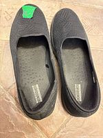 Top view of both shoes showing mesh pattern and interiors