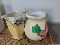 Both pitchers side by side showing shapes, colors, patterns