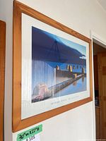 Framed poster on wall