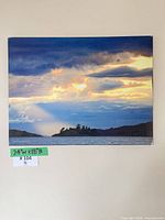 Front view of signed canvas print on wall