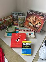 Group shot of all games and puzzles in lot
