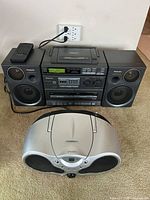 Front view of Panasonic stereo system with remote and Koss boombox