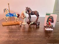 Group shot showing all figurines, egg, and Department 56 box