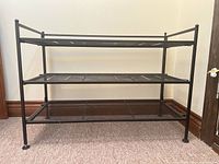 full front view of rack showing three shelves