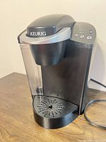 Full view of Keurig coffee maker front and side
