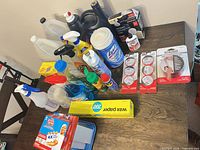Overview of all cleaning, pest and repair items on tabletop