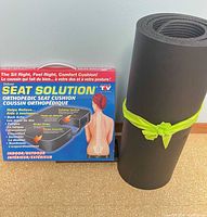 Seat Solution seat cushion box beside rolled black foam mat