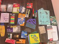 All office supply items laid out on table