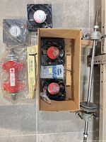 Overview of cooling fans, packaged mandrel, and mounted shaft assembly