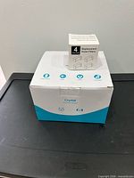 Retail box of Crystal pet water fountain with filter box on top